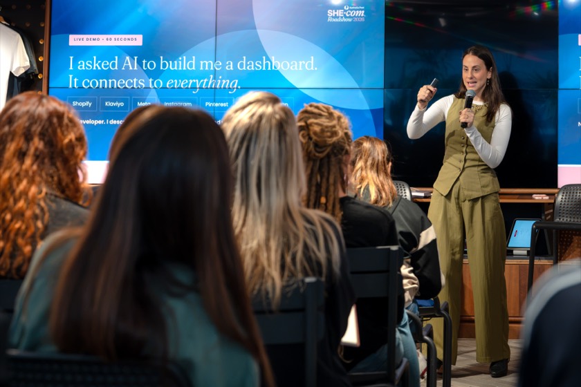 Gabi presenting her AI dashboard at the SHE-com Roadshow