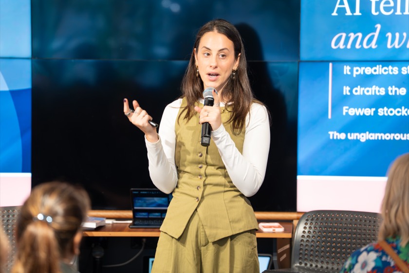 Gabi mid sentence on stage at the SHE-com Roadshow